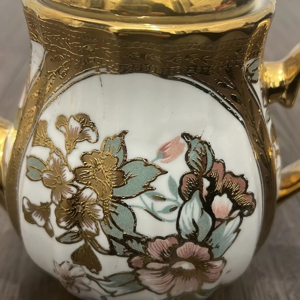Elegant glass decorative floral teapot